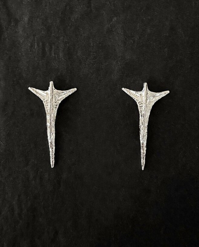 modern silver earrings statement